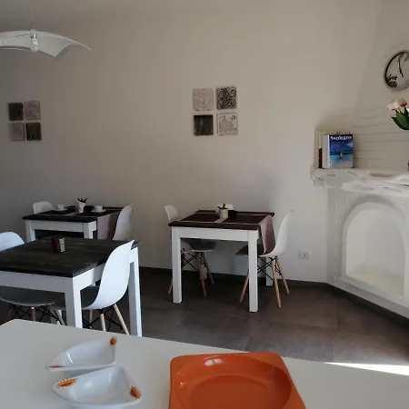 Maison Kaina أولبيا